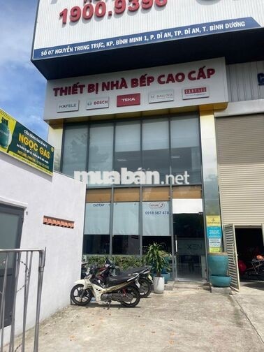 NV GIAO HÀNG BẰNG XE MÁY-THUẬN AN/DĨ AN-BAO Ở