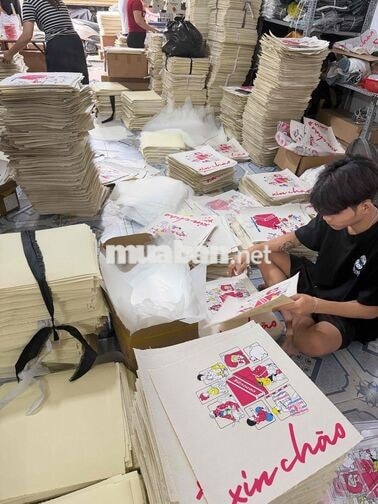 Q12 tuyển thợ ép quần áo lương theo ngày - tháng